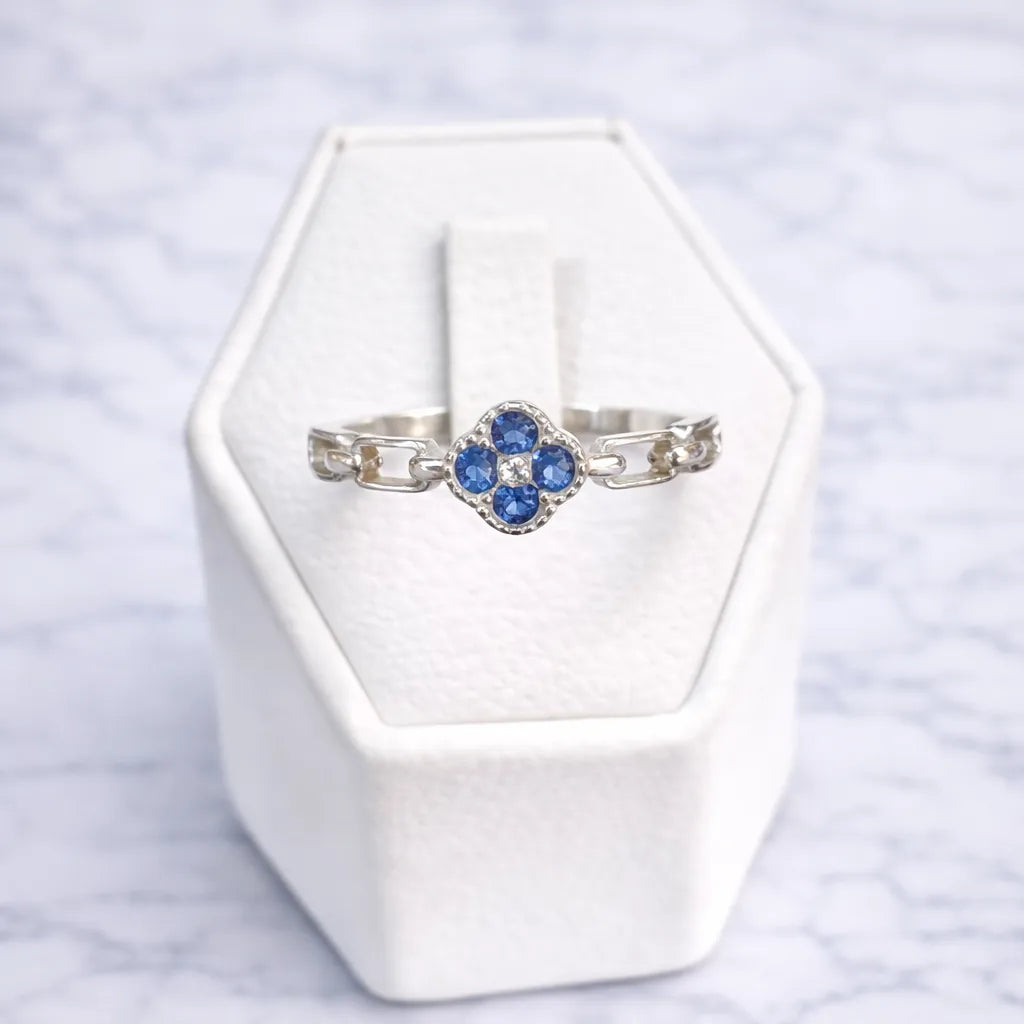 Anillo flor circón zafiro
