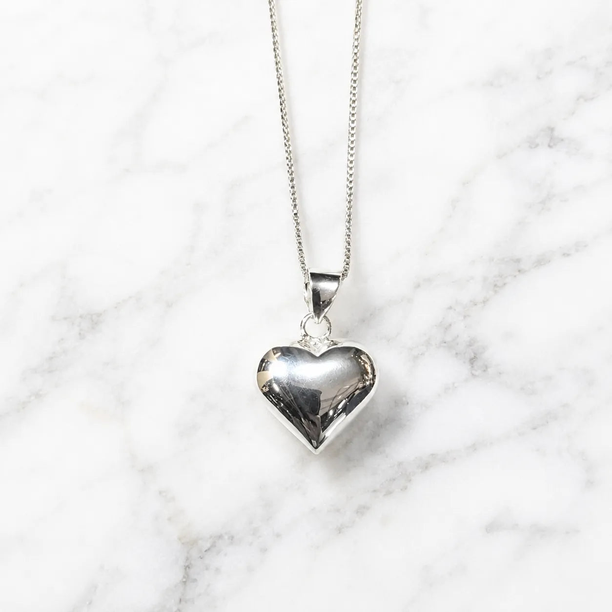Collar corazón inflado