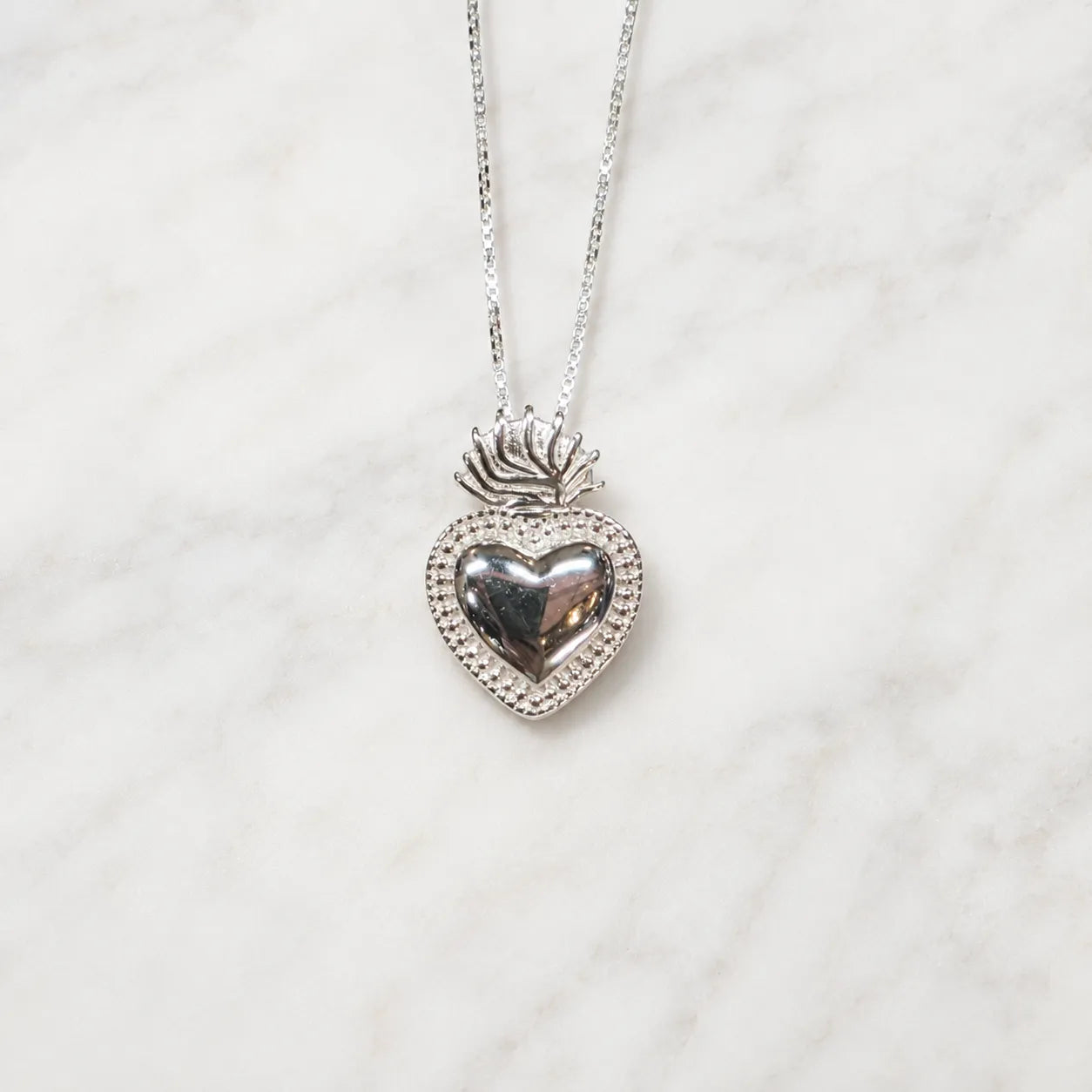 Collar corazón detente