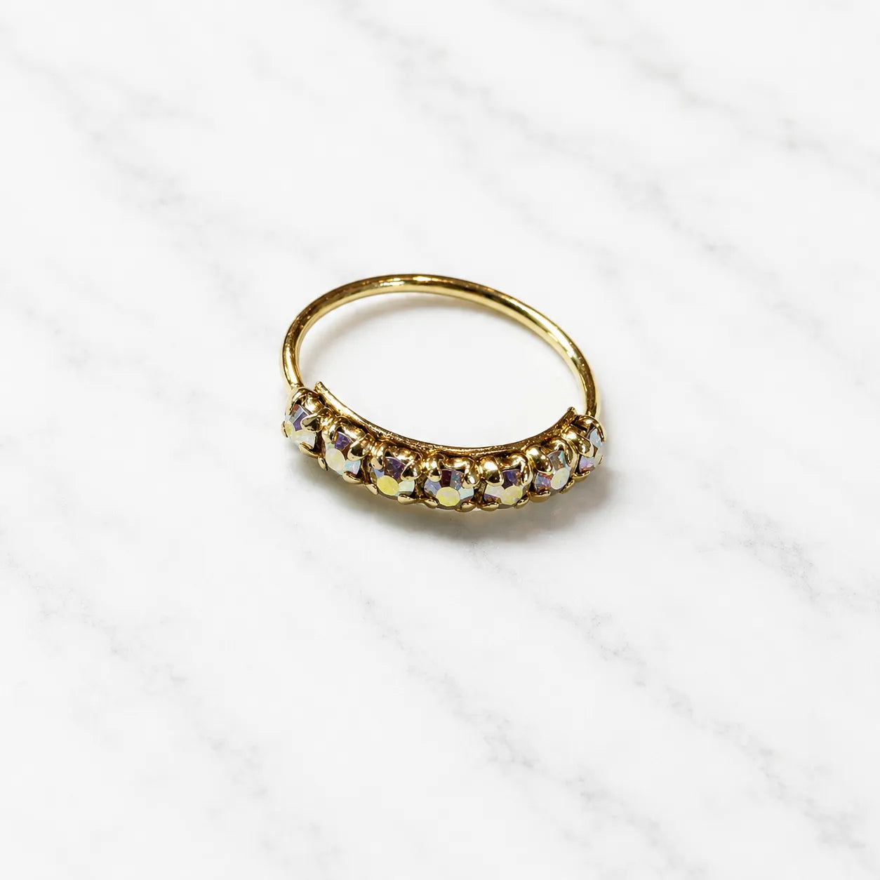 Argolla piercing nariz microcircón tornasol bañado en oro 10mm