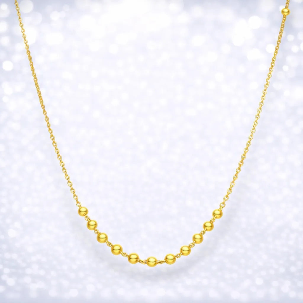 Cadena con esferas bañado en oro 45cm