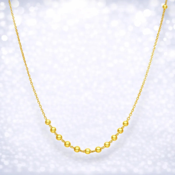 Cadena con esferas bañado en oro 45cm