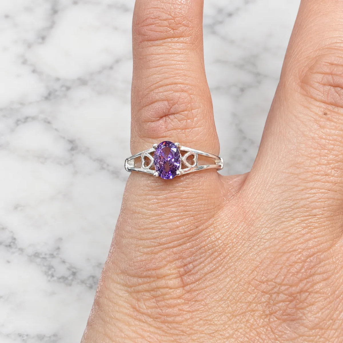 Anillo solitario circón amatista rectagular