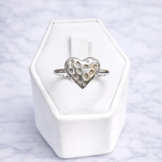 Anillo corazón facetado
