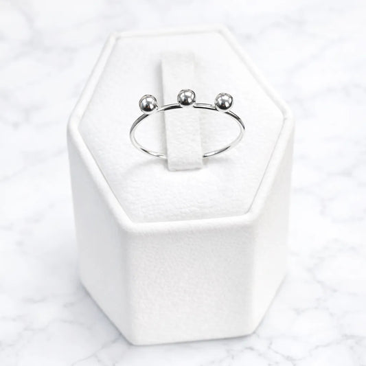 Anillo tres esferas