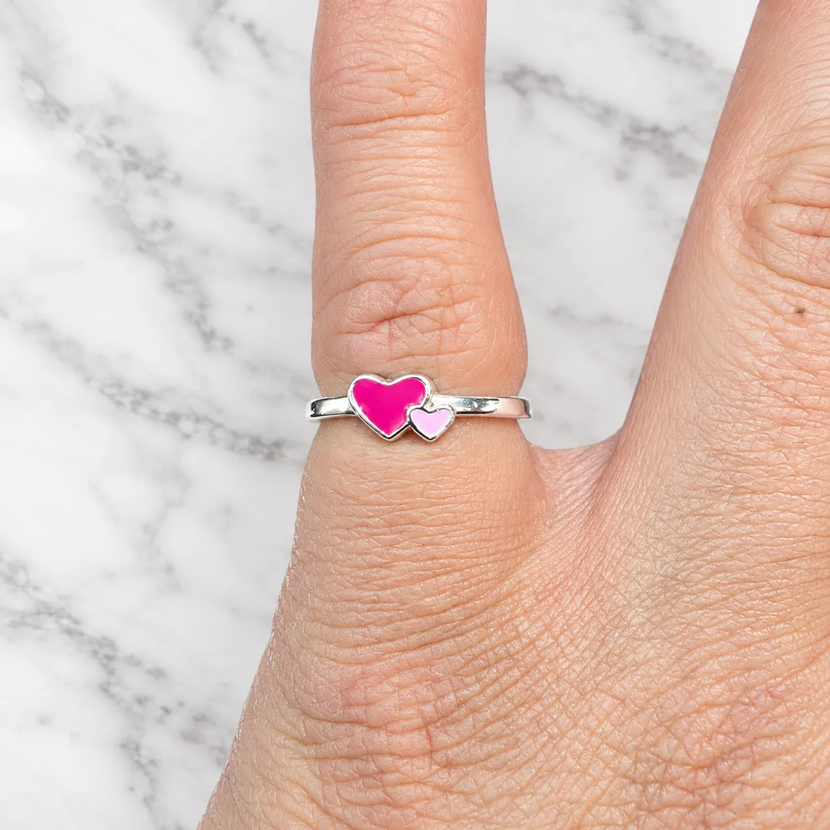 Anillo ajustable doble corazón rosa