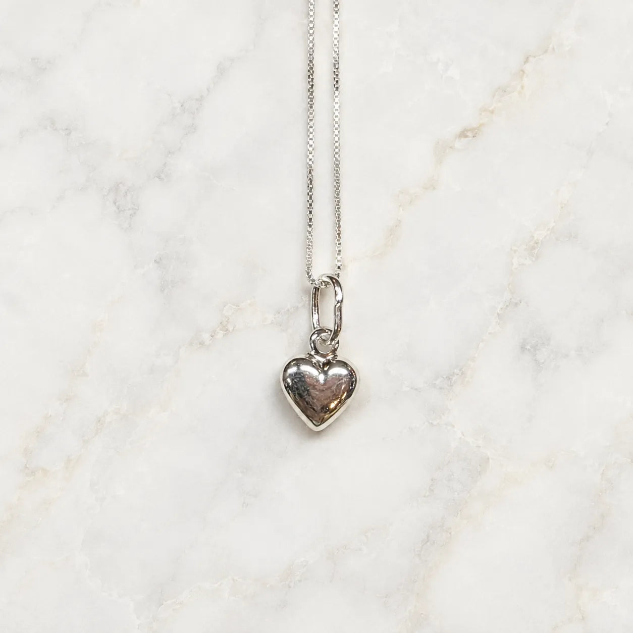 Collar corazón inflado