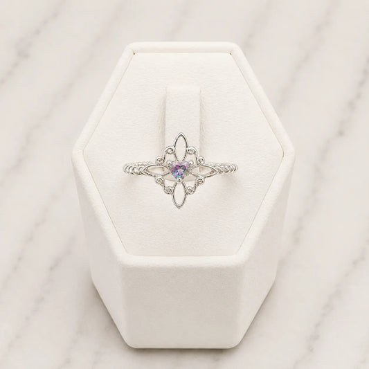 Anillo nudo de bruja microcircón tornasol