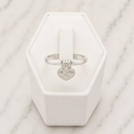 Anillo corazón colgante