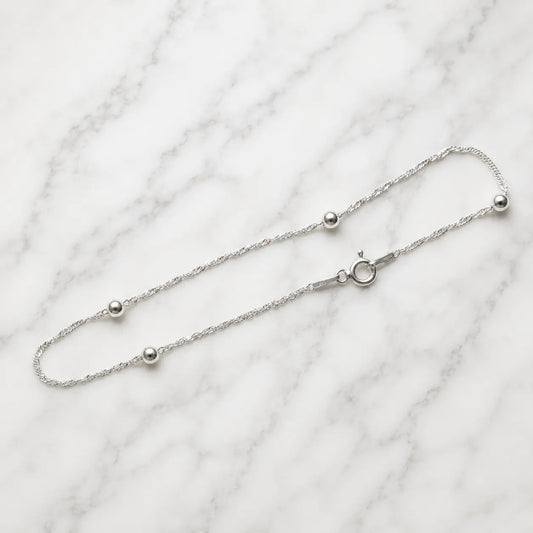 Pulsera eslabón pelotitas 1,2mm