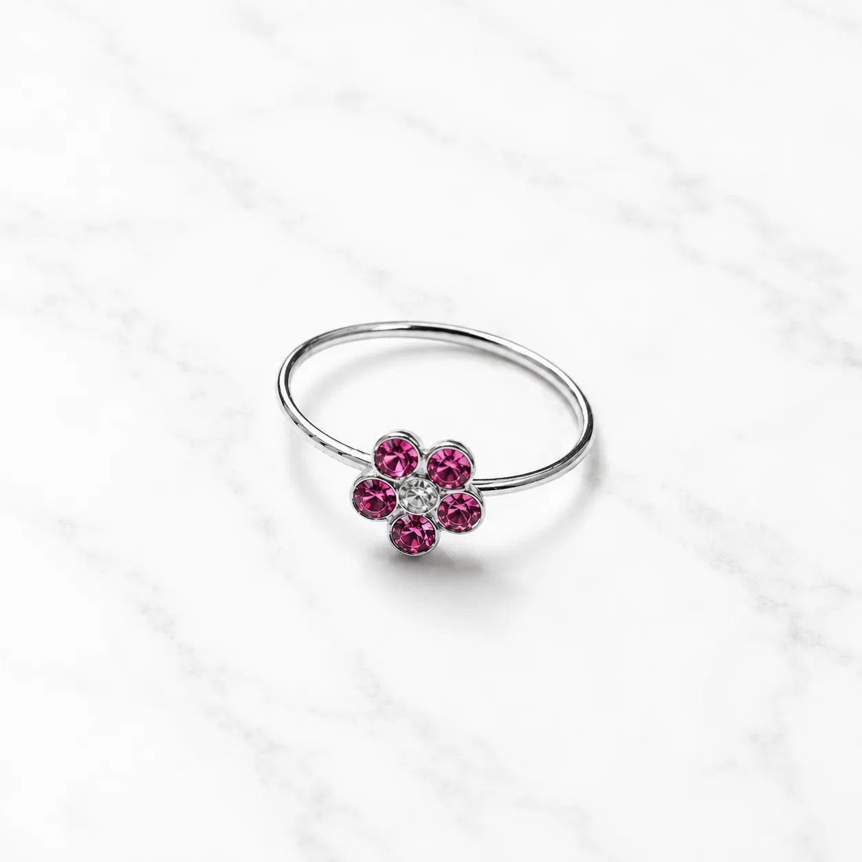 Argolla piercing nariz flor circón fucsia 10mm
