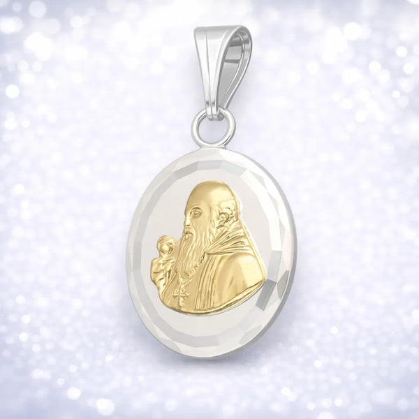 Colgante san benito con baño de oro